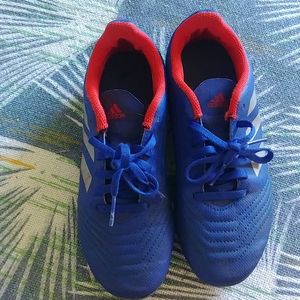 Blue soccer boots